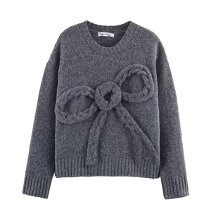 Dark grey crewneck sweater featuring a large 3D knitted bow accent and ribbed cuffs
