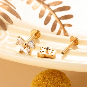 Gold butterfly stud earrings with sparkling zirconia and flat back screw post