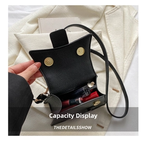Litchi pattern square bag interior showing lipstick storage with dual magnetic clasps