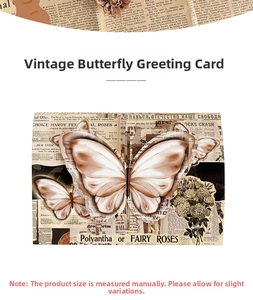 Detail of vintage 3D butterfly pop-up card featuring antique rose patterns and newspaper textures