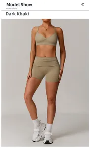 Detail of deep khaki yoga set showing sports bra straps and high waist shorts texture