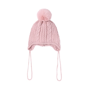 Pink knit baby hat detail featuring cable texture, pom-pom, and protective earflaps