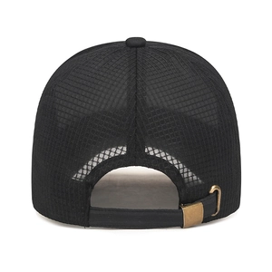 Black mesh trucker cap with adjustable bronze metal buckle and breathable sandwich fabric