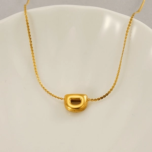 Chubby 26 letters pendant bracelet in gold stainless steel with letter D charm details