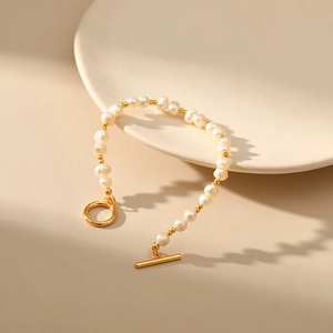 Irregular natural freshwater pearl bracelet with 18K gold-plated OT toggle clasp