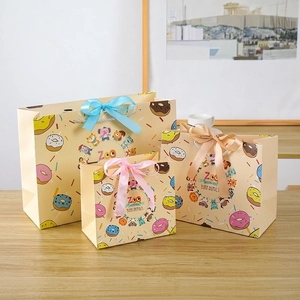 Three-piece set of cartoon animal gift bags with donuts pattern and silk ribbon bows