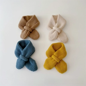 Detailed knit texture of four-color winter scarves including khaki and mustard yellow