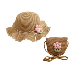 Kids straw sun hat and matching crossbody bag set with decorative pink fabric flowers