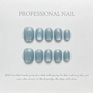 Short round blue cat eye press-on nails set with 10 pieces on display card