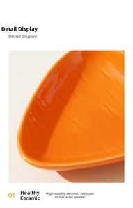 Macro shot of orange ceramic hamster food bowl with carrot texture and glossy glazed finish