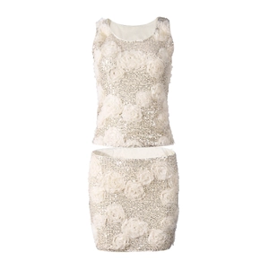 Detail of white two-piece set with shiny sequins and 3D floral embroidery appliques