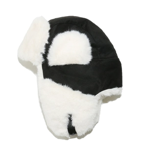 Detail of black aviator hat with thick white faux fur lining and adjustable chin buckle