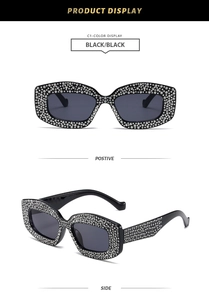 Front and side view of black rhinestone cat-eye sunglasses with polished diamond accents