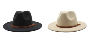 Detail view of black and beige wool fedora hats with brown leather belt buckles