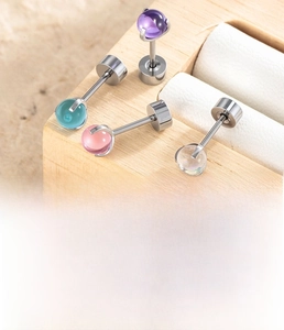Macro shot of 0.8x6mm titanium steel stud earrings with 4mm colorful zircon dragon balls