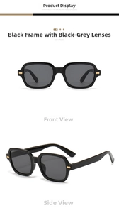Detail of square black sunglasses with dark gray lenses and gold metallic temple hinges