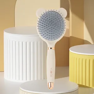 Portable air cushion hairbrush with bear ear design and integrated mirror for scalp massage