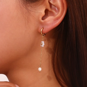 18K gold plated stainless steel drop earrings with freshwater pearls on model