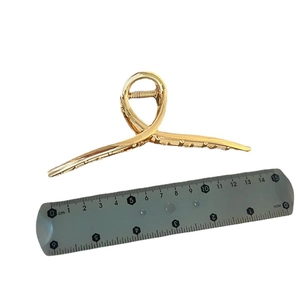 Large 11cm golden metal shark hair claw clip with mirror finish and size reference ruler