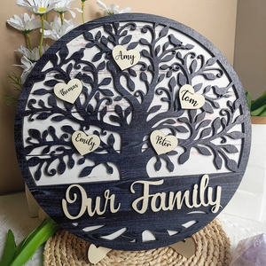 Detailed close-up of custom carved wooden family tree plaque with five name hearts