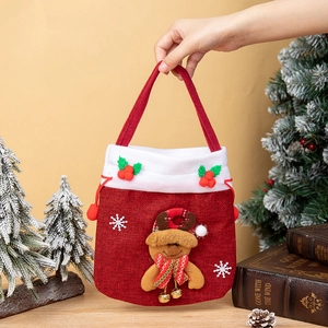 Handheld Christmas drawstring gift bag with reindeer applique and festive bell accents