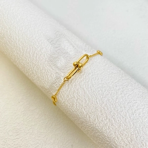 Golden titanium steel bracelet with horseshoe buckle, heart charm and pearls for women
