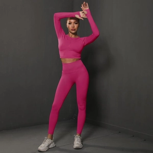 Detail of rose red seamless yoga set with long sleeves thumb holes and high waist leggings