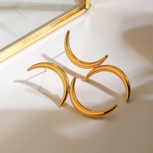 Minimalist golden crescent hoop earrings made of durable polished stainless steel for women