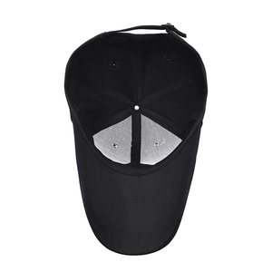 Internal view of black baseball cap with embroidery, structured front, and adjustable buckle