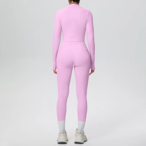 Detail of pink long-sleeve crop top and high-waisted seamless yoga pants from the back