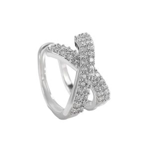 Macro shot of silver-toned crisscross ring featuring full crystal pavé embellishments