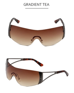 Detail of Y2K rimless sunglasses with gradient tea lenses and side star ornaments