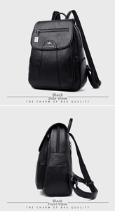 Close-up of black textured leather backpack featuring kangaroo logo and multi-pocket detail