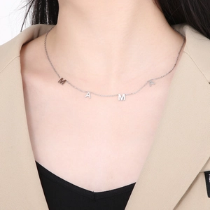 Silver stainless steel MAMA letter necklace worn by model for Mother's Day gift