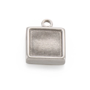 Close-up of a silver stainless steel square pendant base for DIY jewelry making