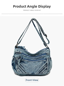 Front view of casual washed denim crossbody bag featuring multiple functional zipper pockets