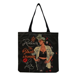 Detail of black canvas tote bag featuring Rockin The Black Woman Life illustration