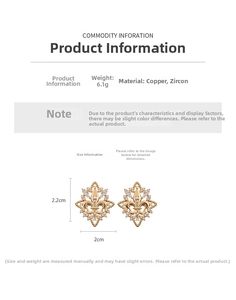 Detail view of 18k gold plated fleur-de-lis earrings with zircons measuring 2.2cm