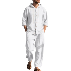 Detail of white linen beach set for men featuring a hooded button shirt and casual pants
