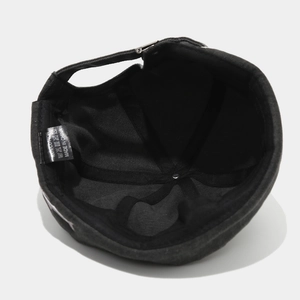 Detail of 100% cotton wash label and inner stitching on vintage black miki hat