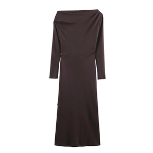 Detail of soft dark brown fabric and elegant diagonal neckline on long sleeve dress