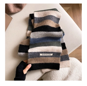 Detail of soft rainbow mohair scarf with knit texture and BIGHT NOW AZKR label