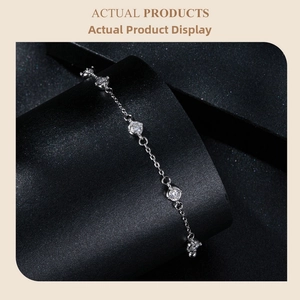 Close-up of sparkling moissanite stones on a 925 sterling silver chain bracelet