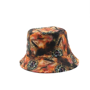 Double-sided bucket hat featuring vibrant cosmic nebula print and mandala patterns