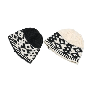 Bohemian geometric knit beanie set in black and white diamond jacquard for winter warmth