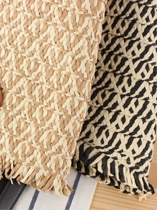 Fashionable large woven shoulder bag in beige and black-white texture with fringe details