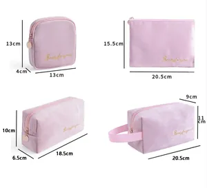 Detailed size guide for the four-piece flannel cosmetic bag set with exact dimensions