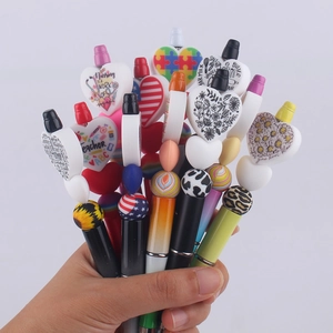 Creative DIY heart-shaped beaded pens with colorful cartoon prints and professional themes