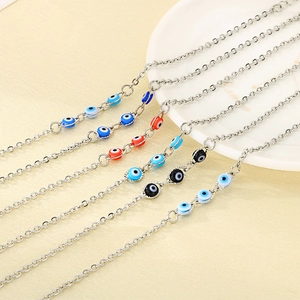 Silver stainless steel O-chain bracelets with colorful evil eye beads in multiple styles