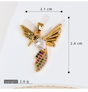 Detailed view of hummingbird pendant with cubic zirconia and exact dimensions